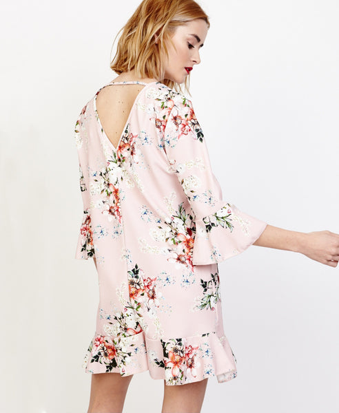 Bella London Willa Blush Floral Bell Sleeve Shift Dress With Ruffle Hem. Back View