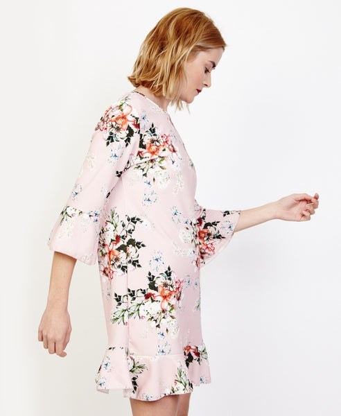 Bella London Willa Blush Floral Bell Sleeve Shift Dress With Ruffle Hem. Side View