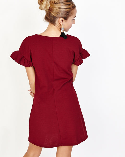 Bella London Ziva Wine Shift Dress With Pearls V-Neck And Frill Detail. Back View