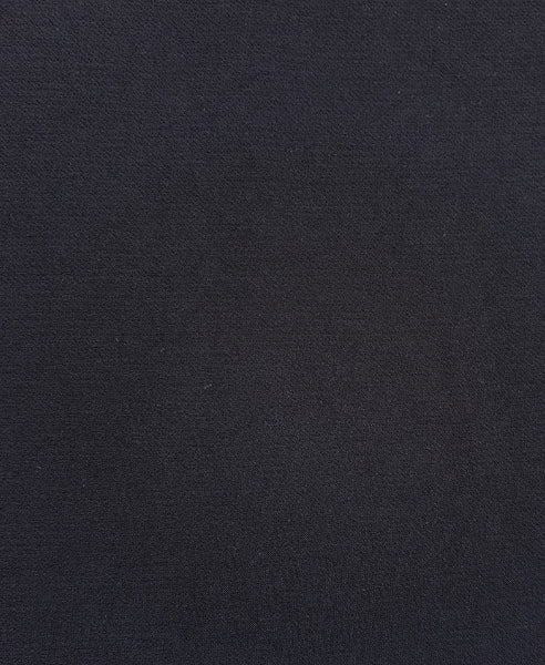 Bella London Black asymmetric skirt. Fabric photo.