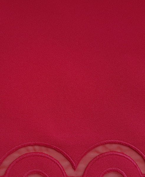 Bella London Red mini skirt with embroidered scalloped hem and organza inserts. Fabric photo.