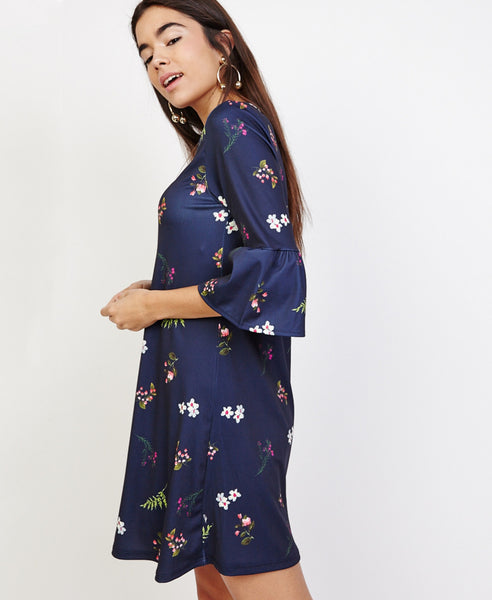 Bella London Gloria Navy Floral Print Shift Dress With Bell Sleeves. Side View