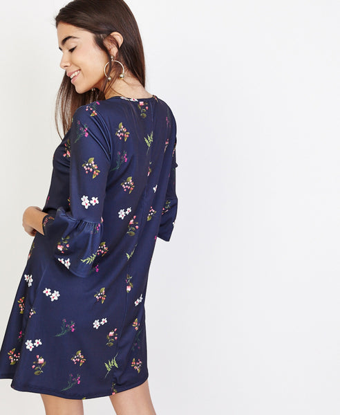 Bella London Gloria Navy Floral Print Shift Dress With Bell Sleeves. Back View