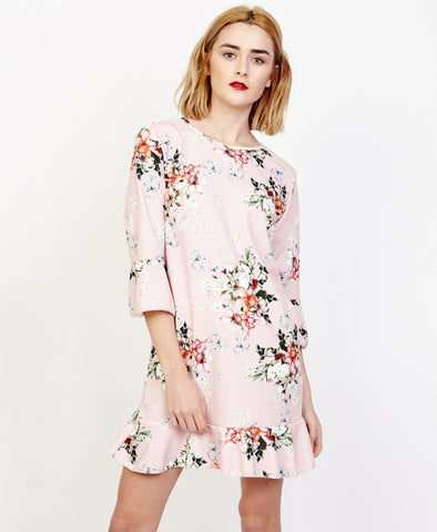 Bella London Willa Blush Floral Bell Sleeve Shift Dress With Ruffle Hem. Front View