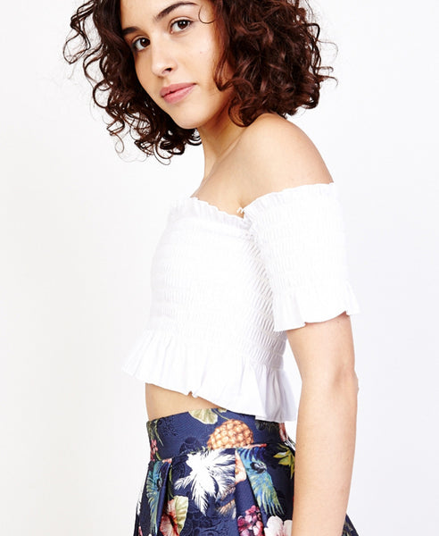 Bella London Kyla White Off The Shoulder Bardot Shirred Crop Top With Saleeves And Ruffle Hem. Side View