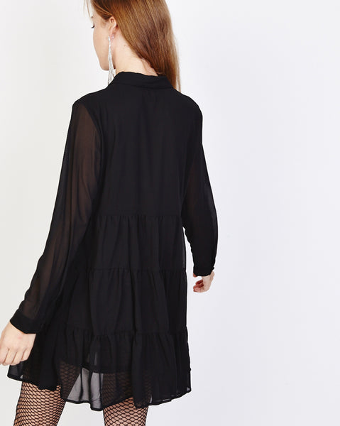 Bella London Paola Black Chiffon Shirt Dress With Sheer Sleeves And Ruffled Skirt. Back View.
