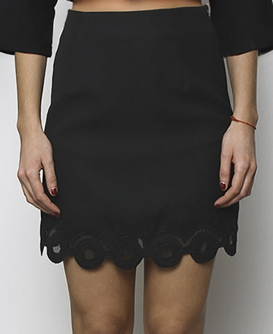 Bella London Black mini skirt with embroidered scalloped hem and organza inserts. Front photo.