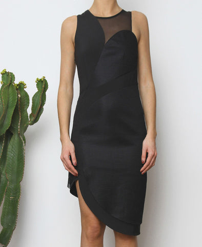 Bella London Panelled asymmetric black dress with mesh inserts. Front cropped photo.